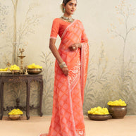 Orange embroidered chiffon saree casual wear