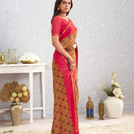 Orange floral printed georgette saree wedding wear