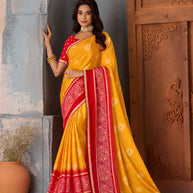 Mustard bandhani printed silk blend saree festive wear
