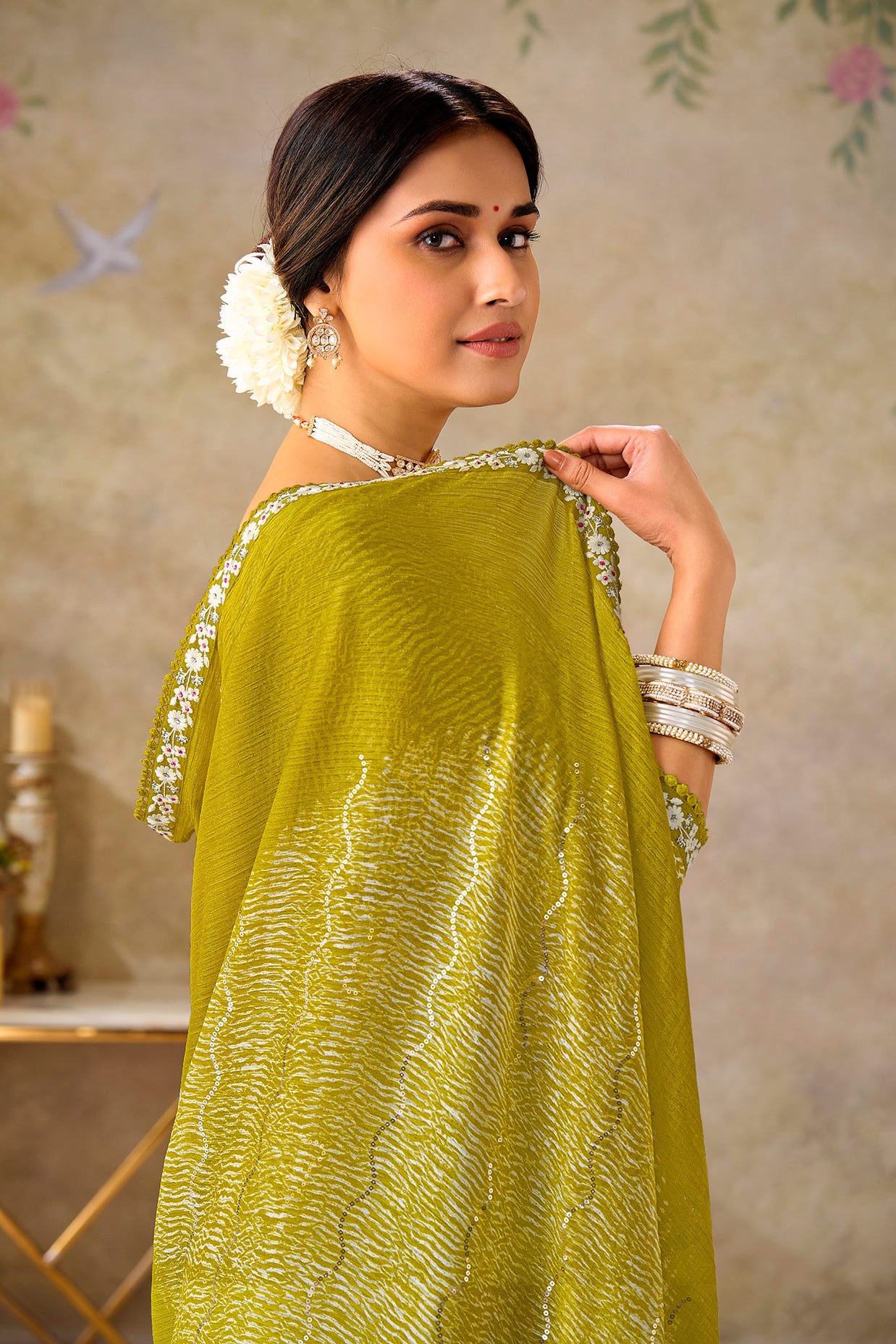 Green embroidered chiffon saree casual wear