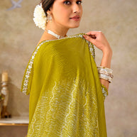 Green embroidered chiffon saree casual wear