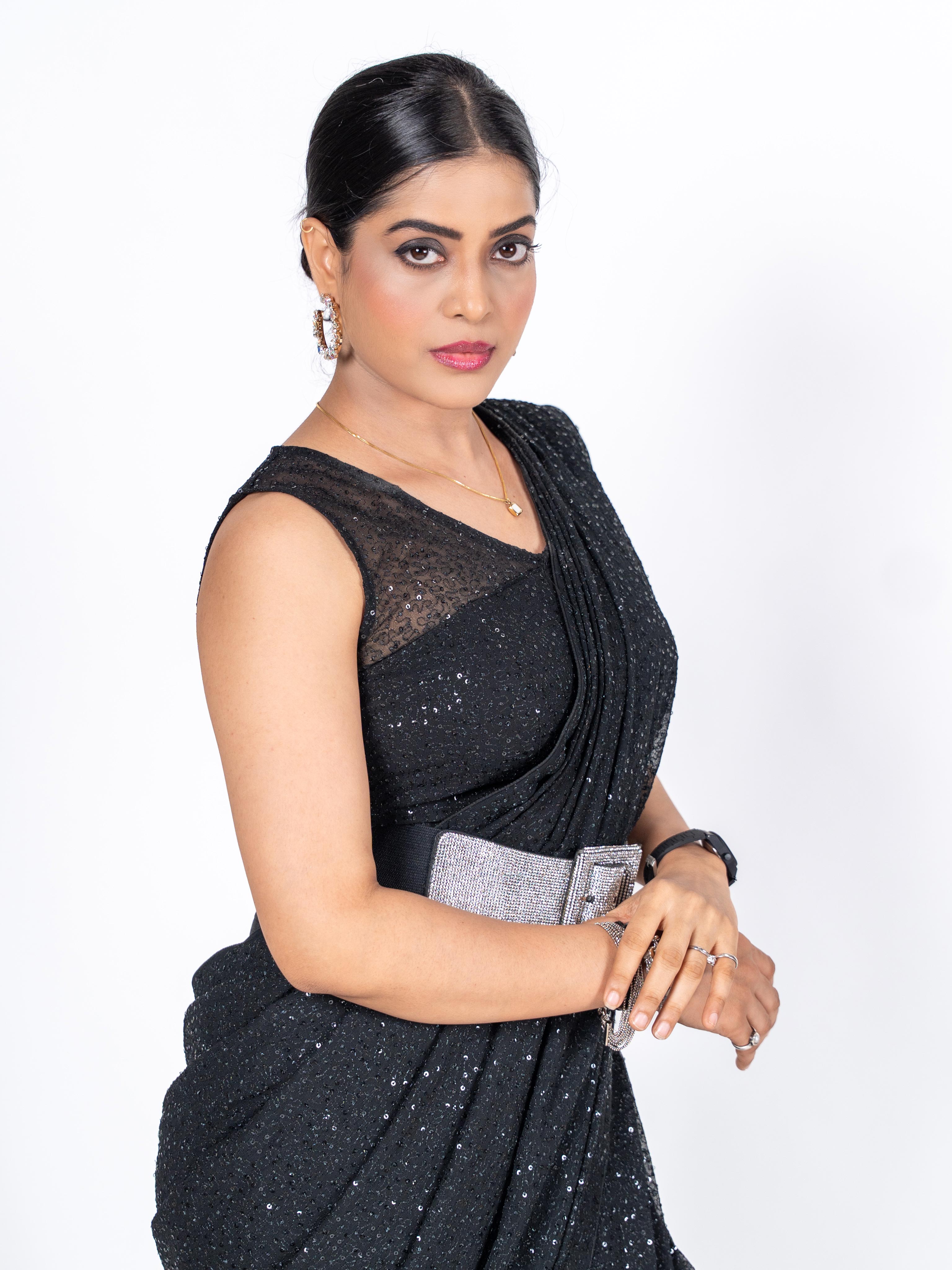 Black sequin embroidered georgette saree evening wear