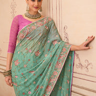 Green embroidered chiffon saree wedding wear
