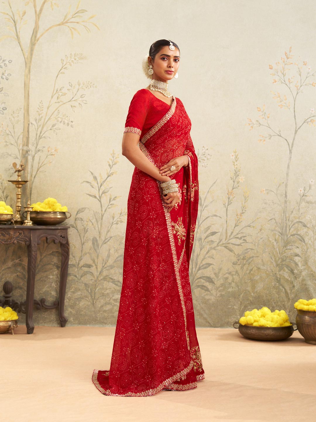 Red embroidered chiffon saree wedding wear