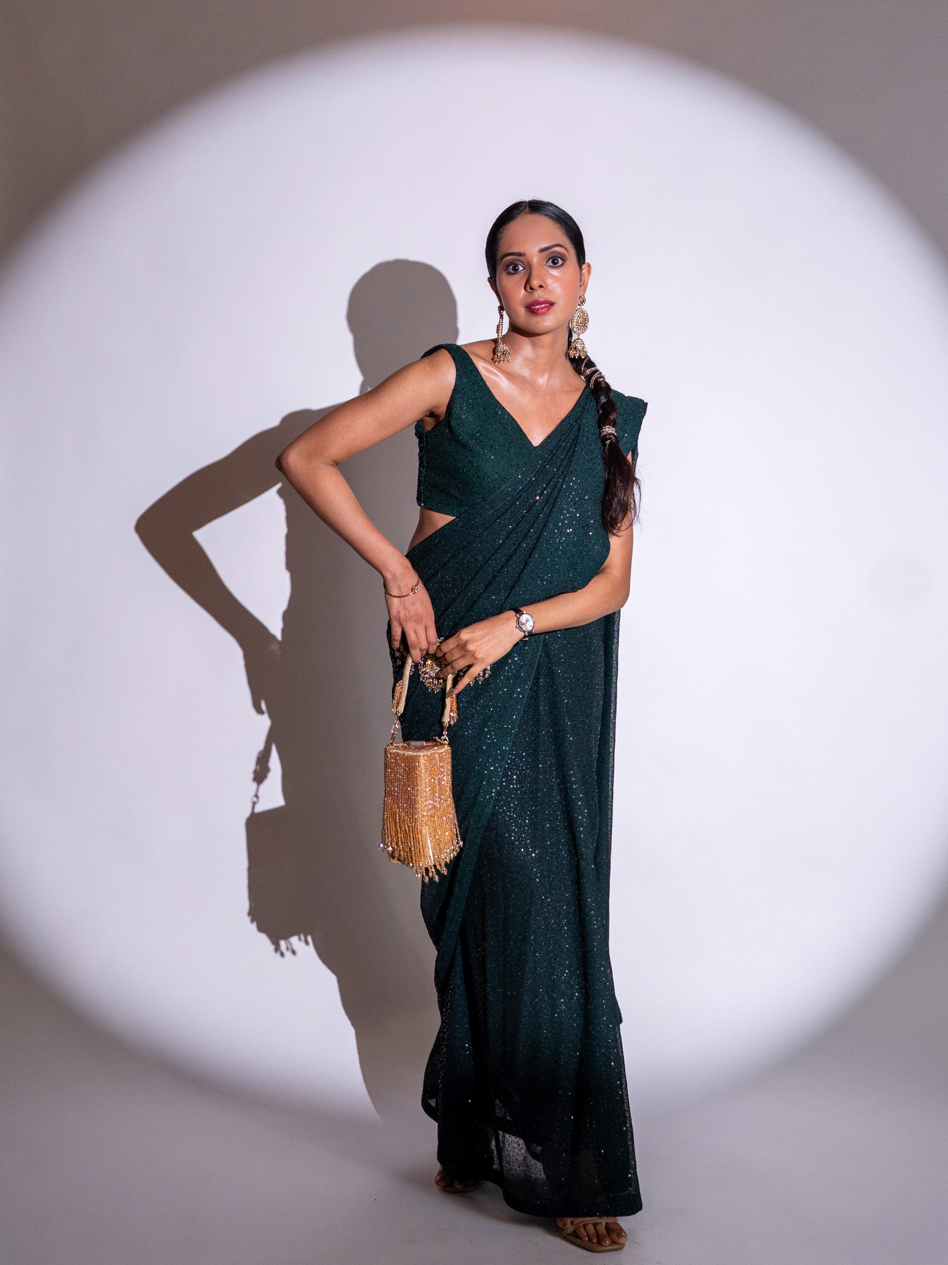 Green sequin embroidered georgette saree party wear