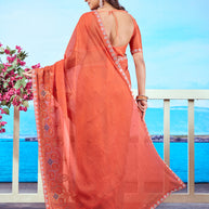 Orange silver embroidered chiffon saree occasion wear