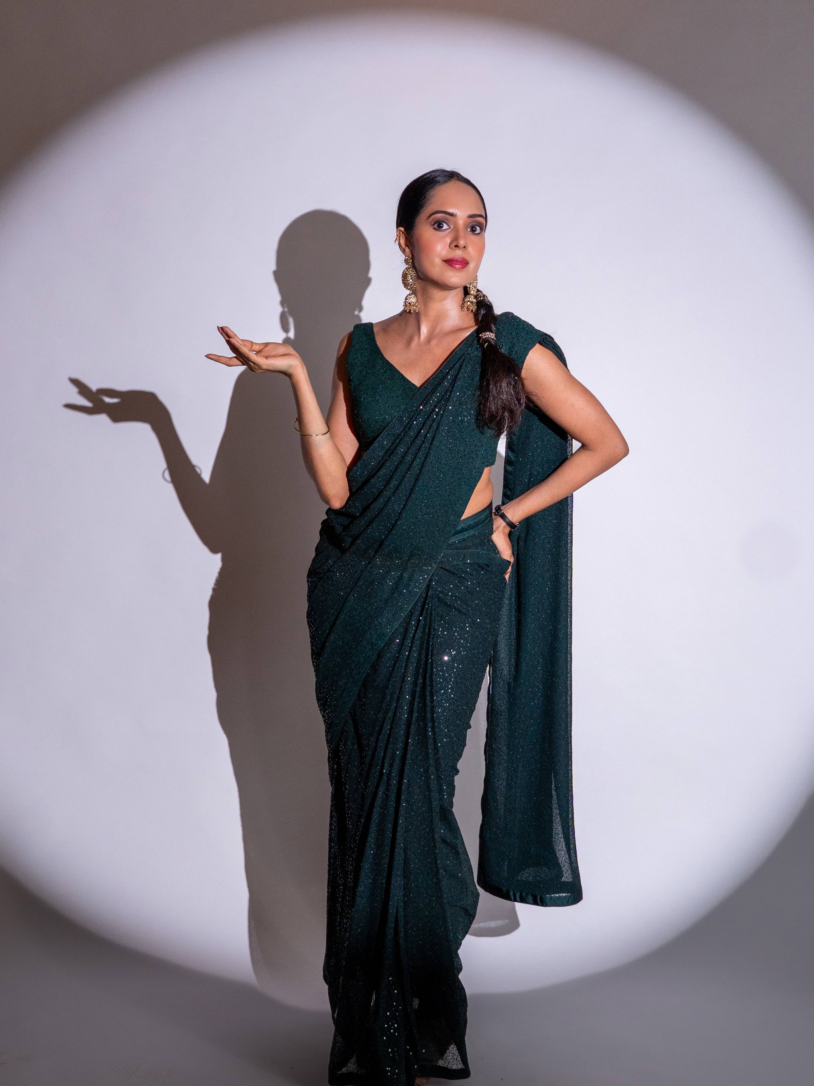 Green sequin embroidered georgette saree festive wear