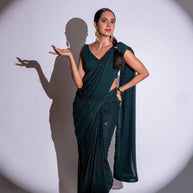 Green sequin embroidered georgette saree festive wear