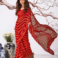 Red wavy striped printed georgette saree festive wear