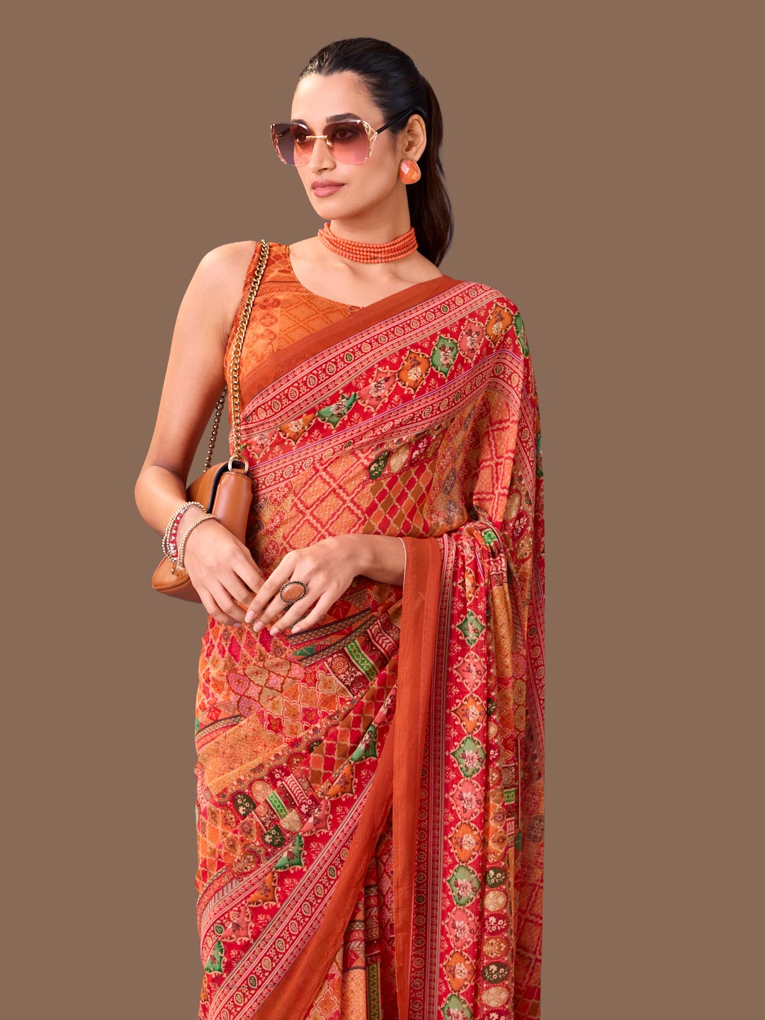 Laxmipati Dillagi Orange Georgette Floral Saree