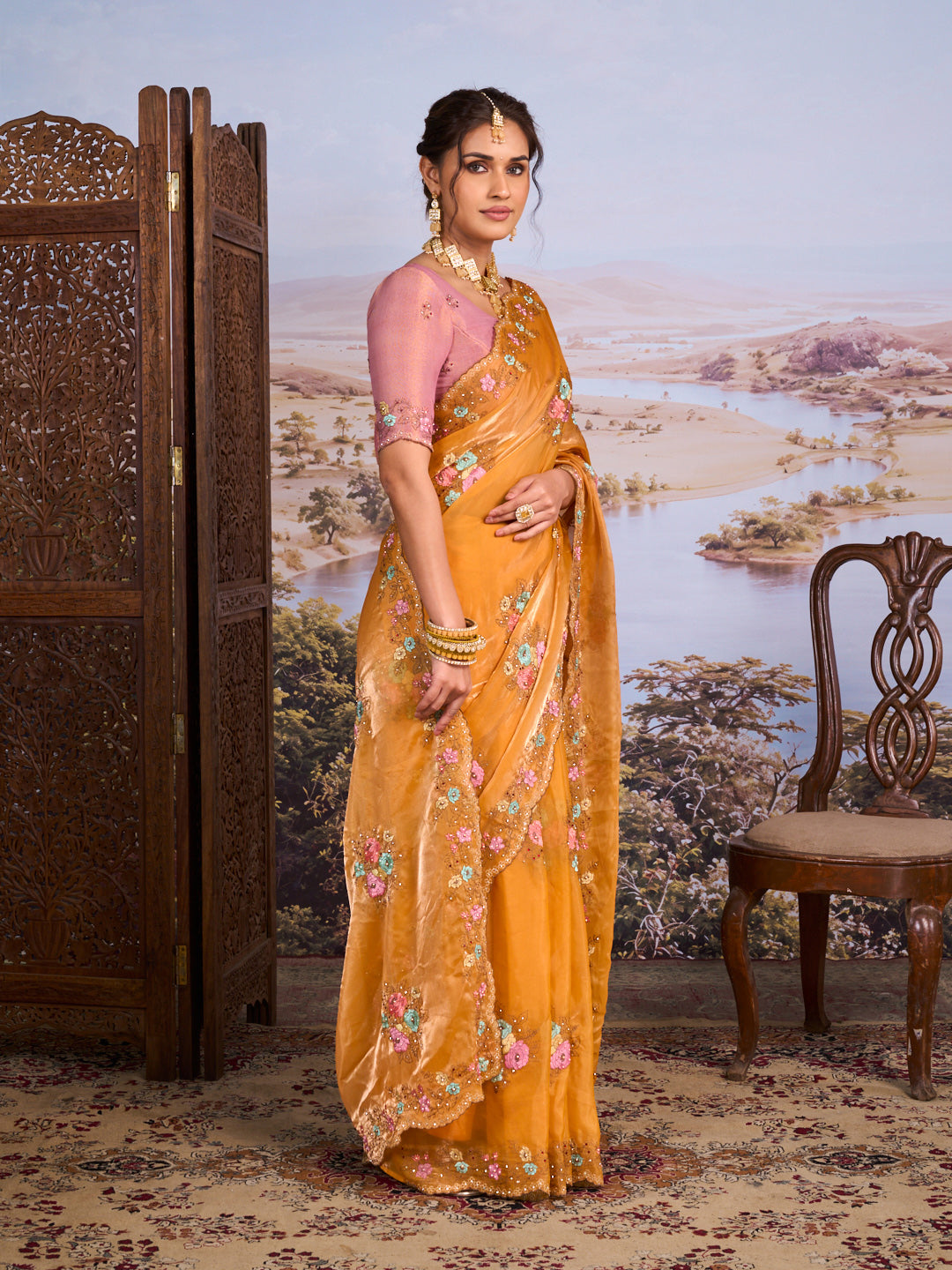 Orange floral embroidered chiffon saree casual wear