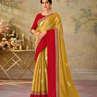 Mustard embroidered chiffon saree party wear