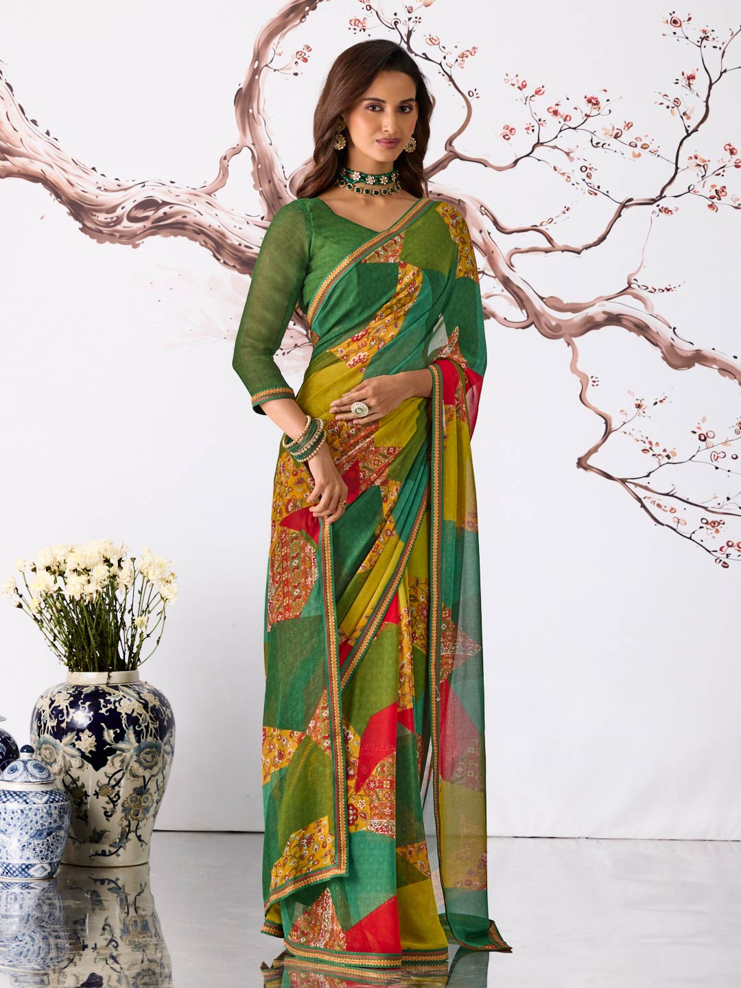 Green geometric printed georgette saree festive wear