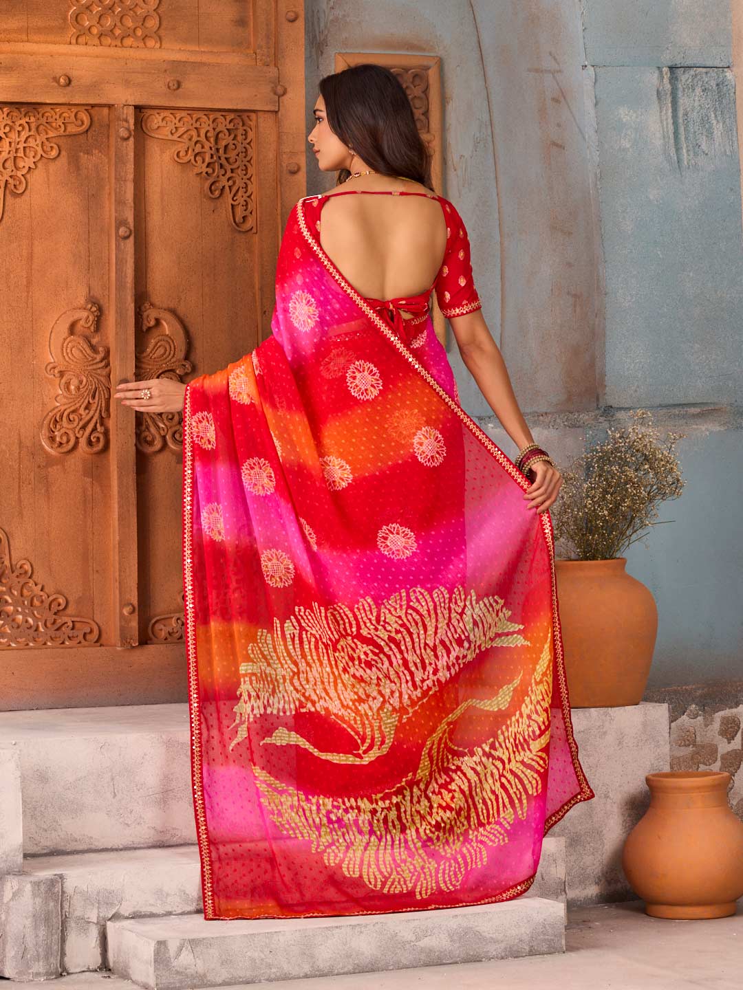 Red bandhani printed chiffon saree party wear