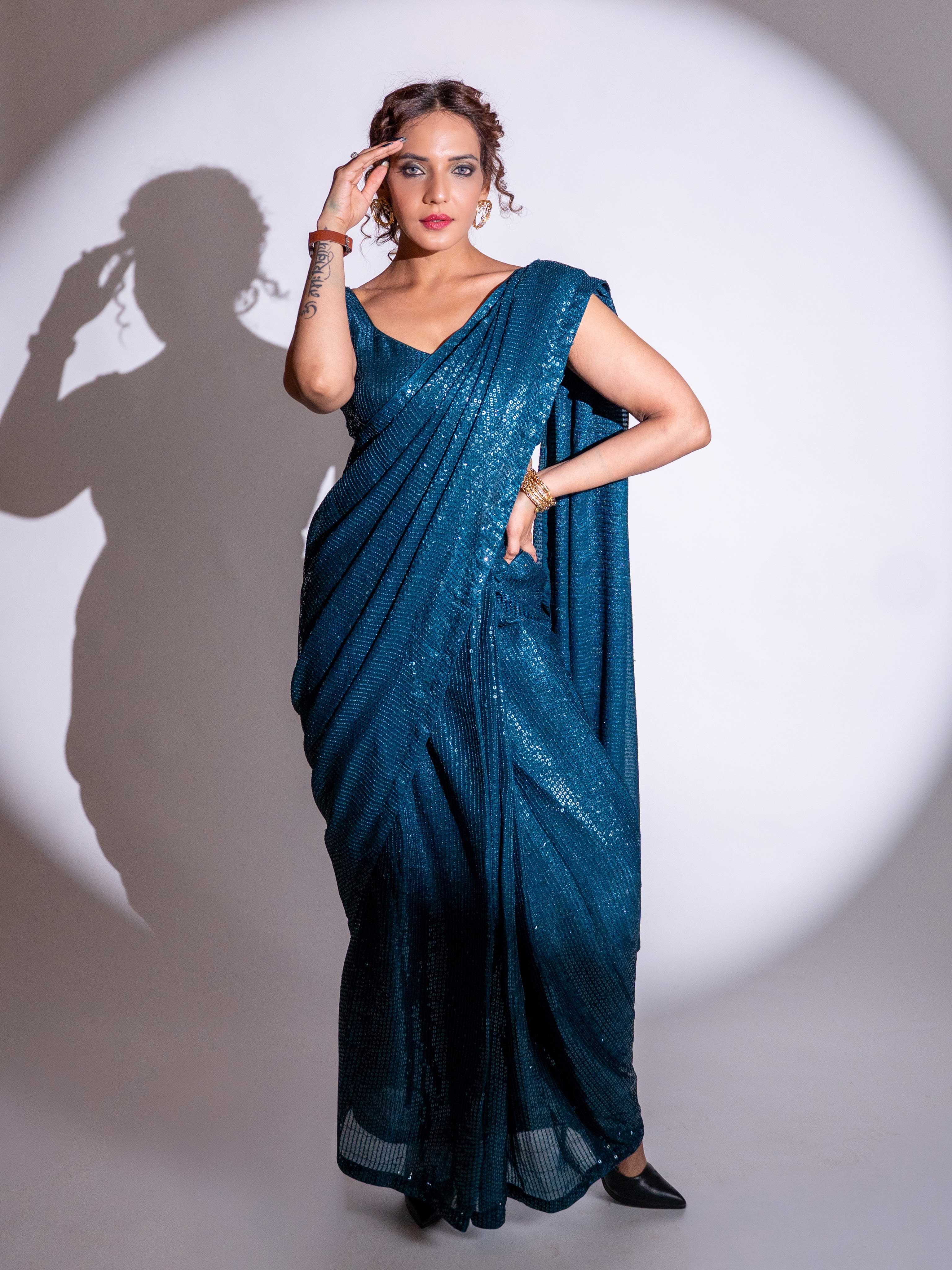 Blue sequin embroidered georgette saree party wear