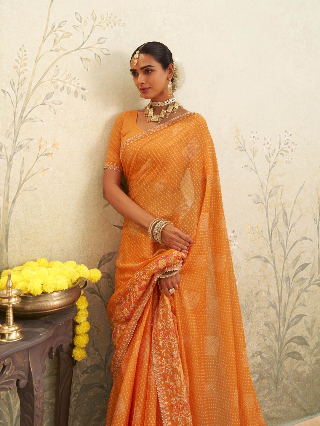Orange floral embroidered chiffon saree casual wear