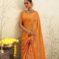 Orange floral embroidered chiffon saree casual wear
