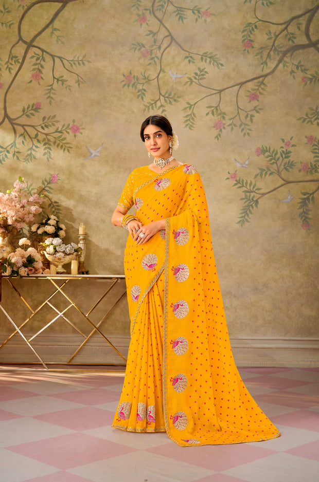 Yellow embroidered chiffon saree party wear