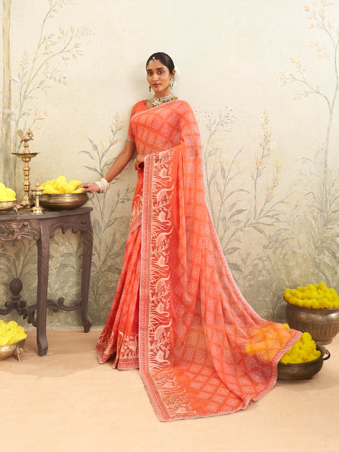 Orange embroidered chiffon saree wedding wear