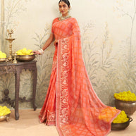 Orange embroidered chiffon saree wedding wear