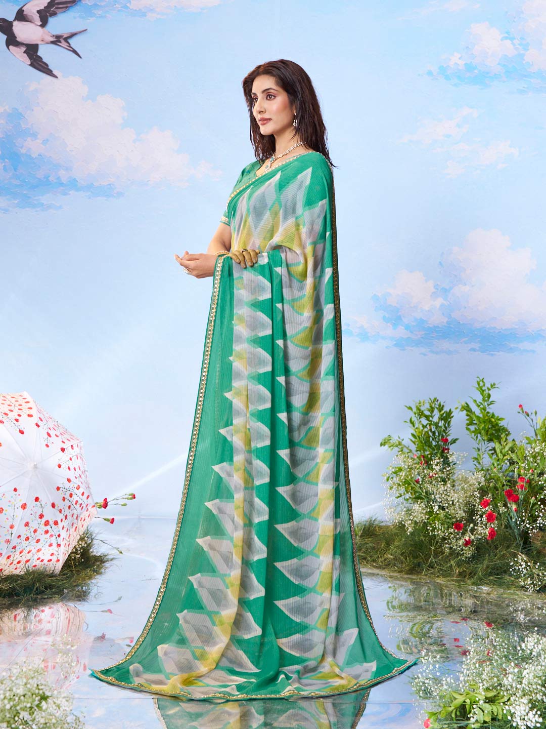 Green embroidered chiffon saree festive wear