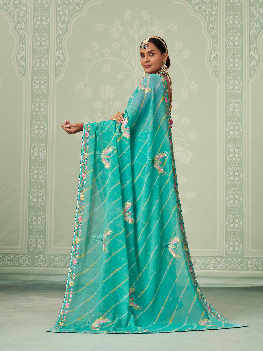 Green embroidered chiffon saree casual wear