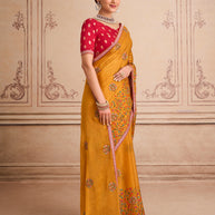 Orange floral embroidered chiffon saree casual wear