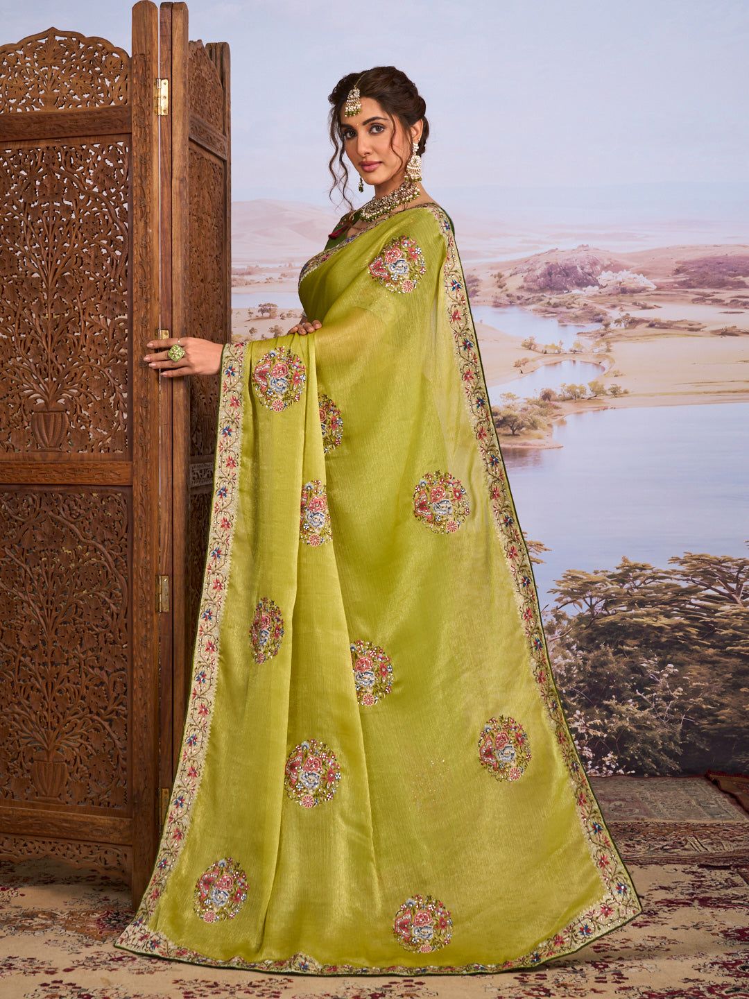 Green floral embroidered chiffon saree casual wear