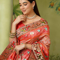 Orange embroidered silk blend saree wedding wear