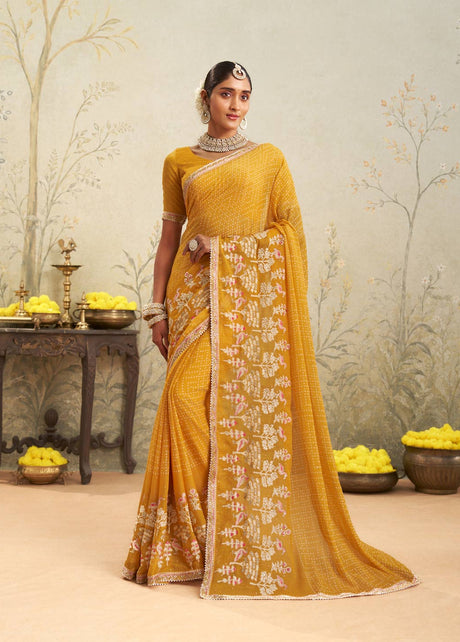Yellow embroidered chiffon saree daily wear