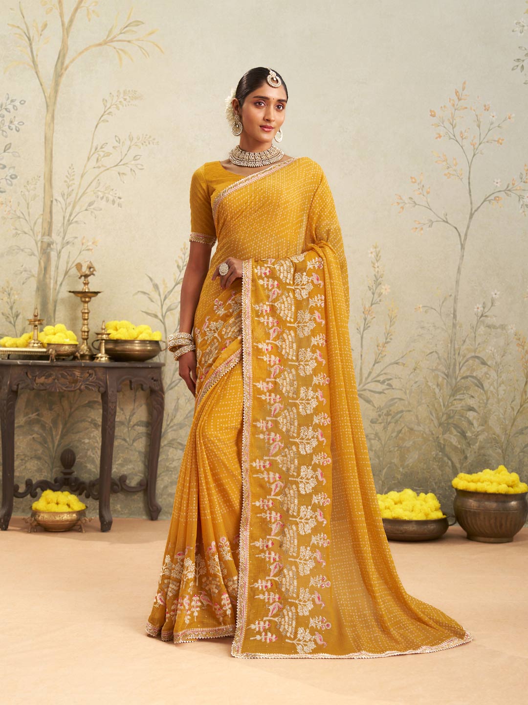 Yellow embroidered chiffon saree daily wear