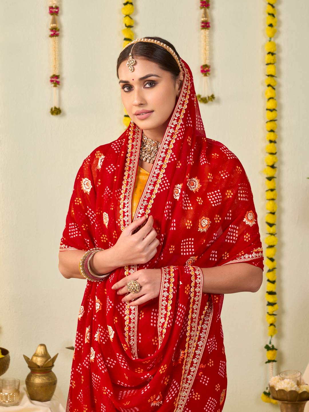 Red bandhani printed georgette saree wedding wear