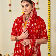 Red bandhani printed georgette saree wedding wear