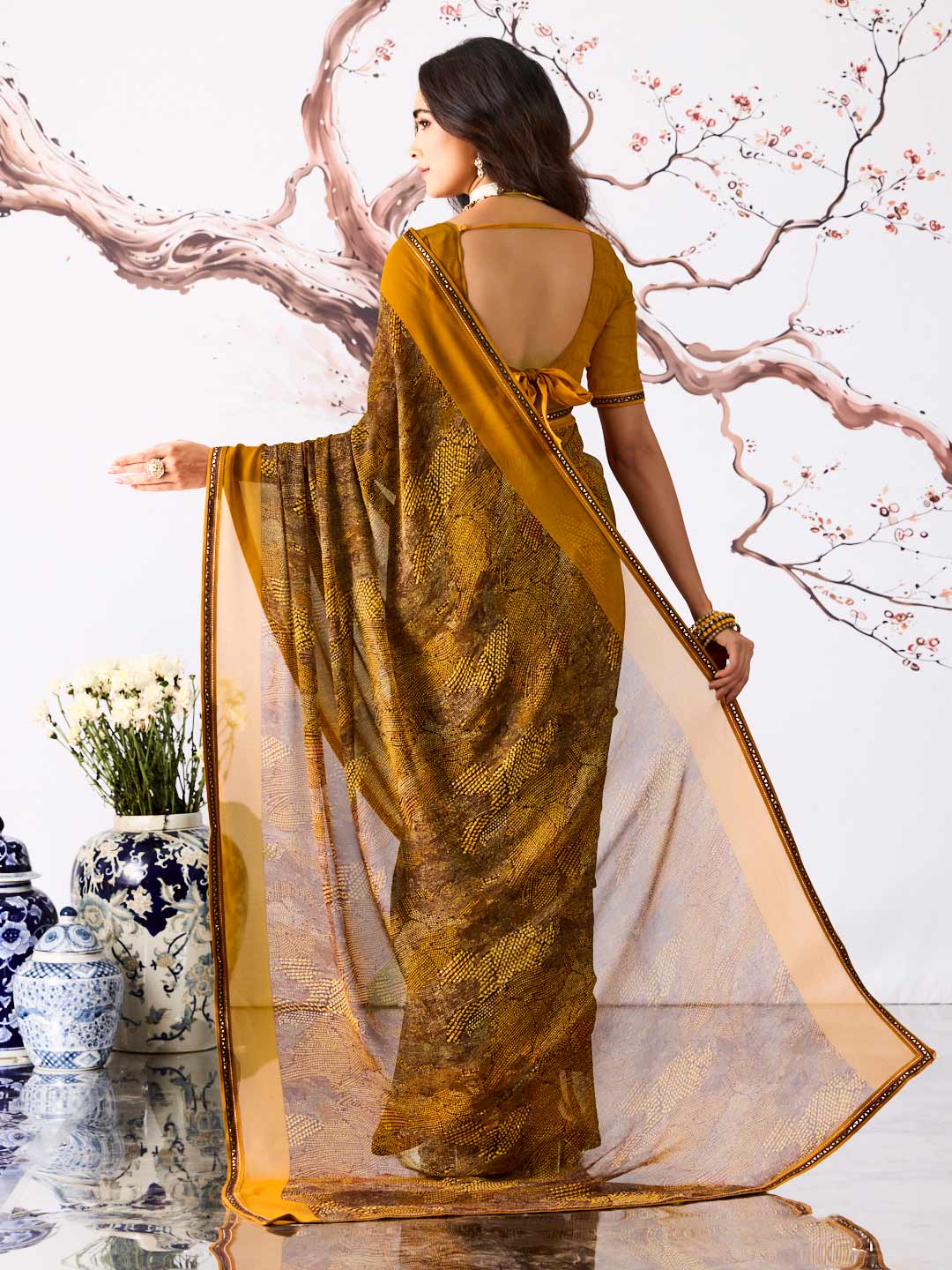 Brown textured georgette saree daily wear