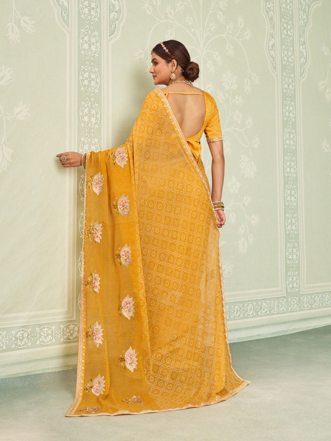 Yellow embroidered chiffon saree daily wear