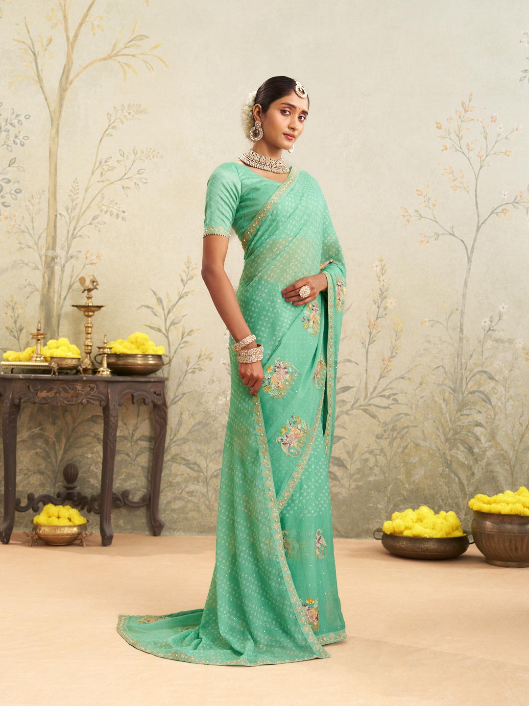 Green embroidered chiffon saree wedding wear