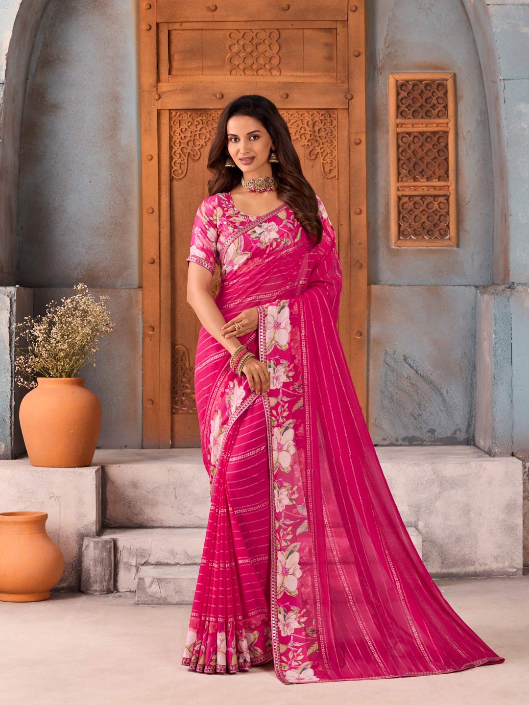 Pink floral printed striped georgette saree daily wear