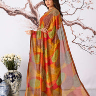 Orange abstract motif printed georgette saree festive wear