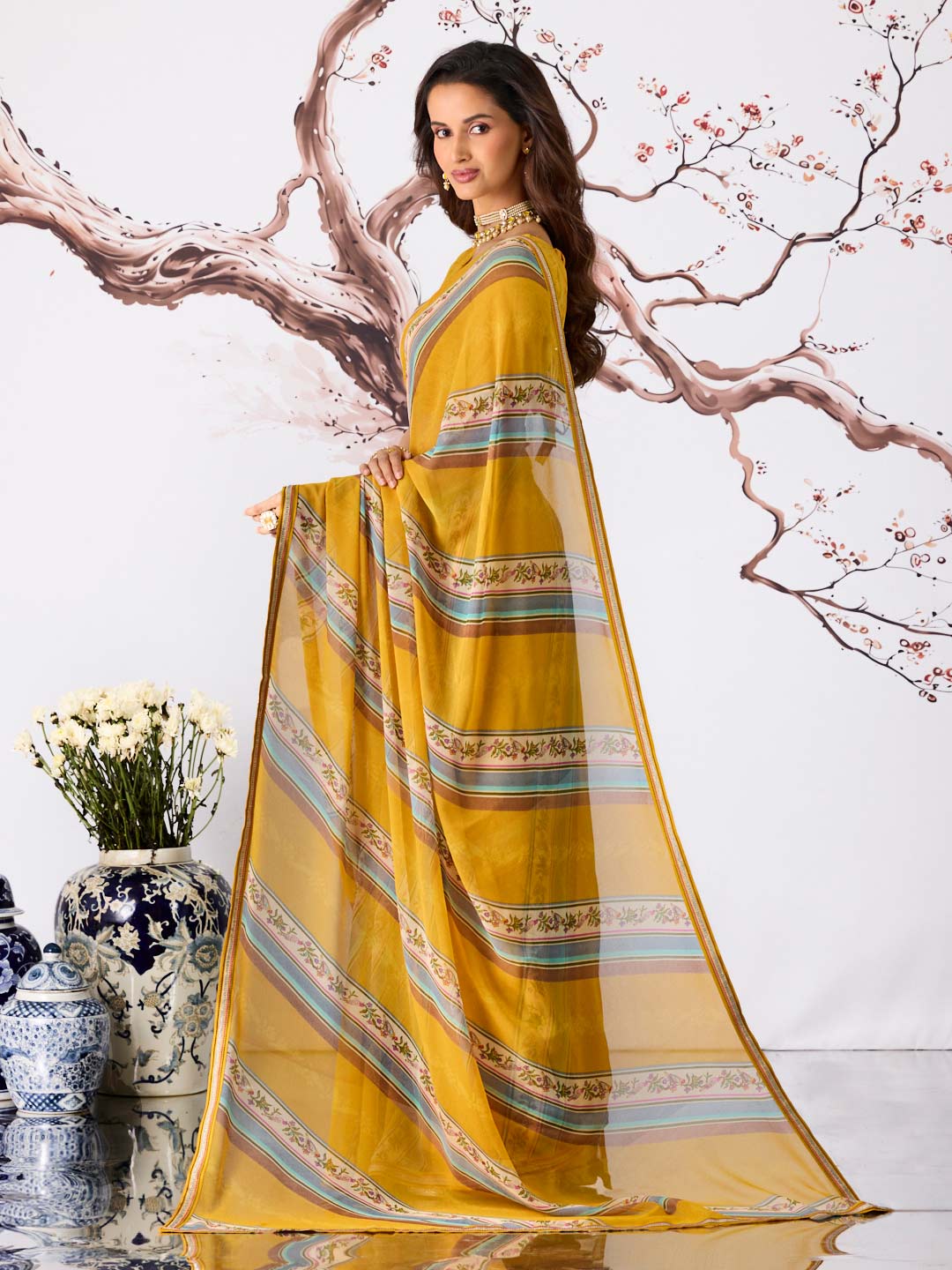 Yellow striped printed georgette saree party wear