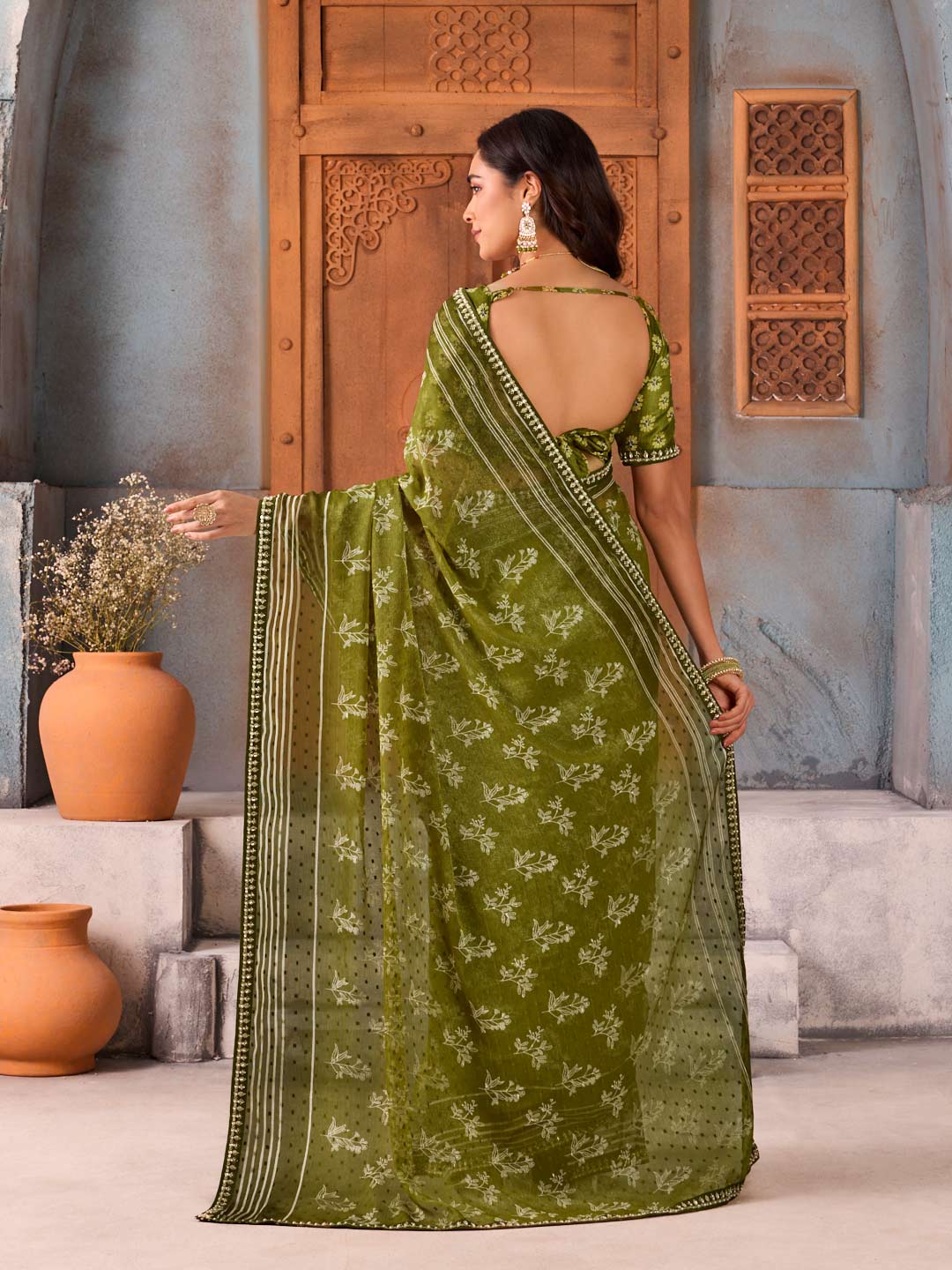 Green floral printed chiffon saree casual wear