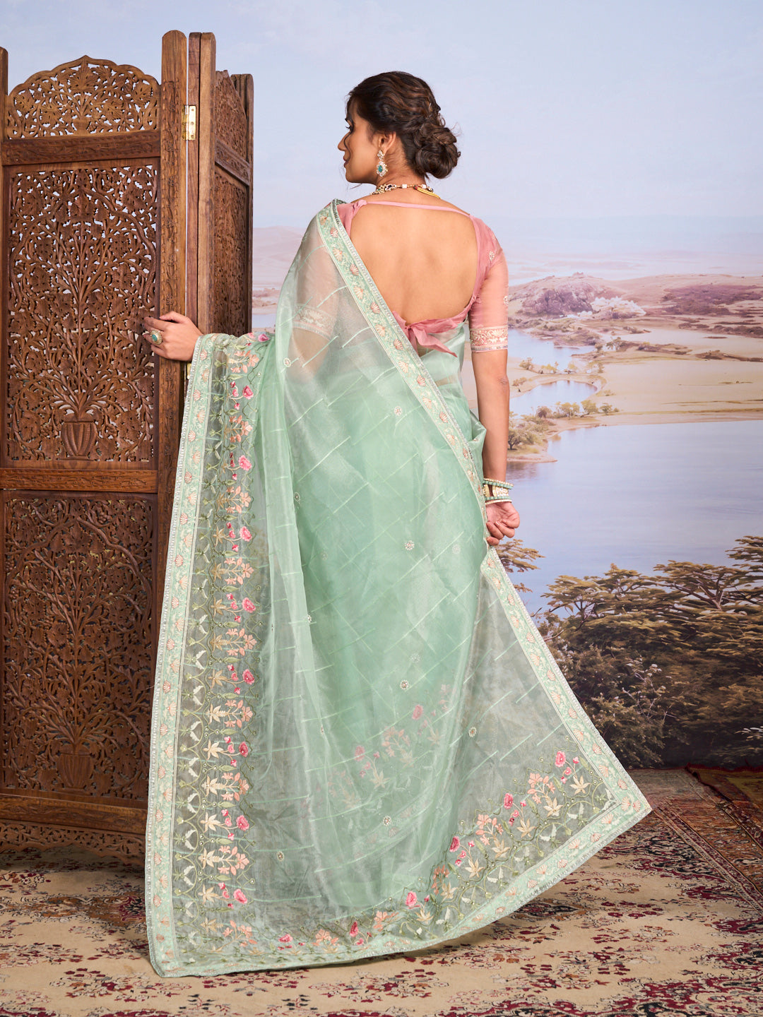 Green floral embroidered tissue organza saree party wear