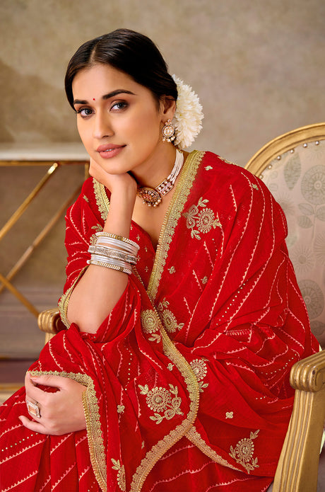 Red embroidered chiffon saree party wear