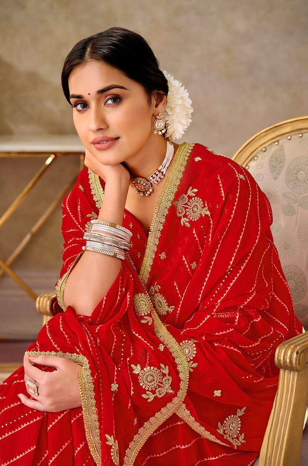 Red embroidered chiffon saree party wear