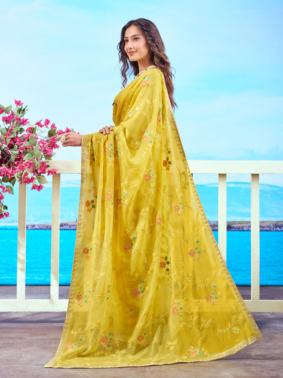 Yellow floral embroidered chiffon saree elegant wear