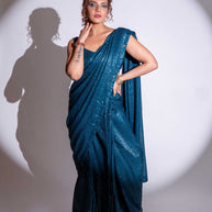 Blue sequin embroidered georgette saree wedding wear