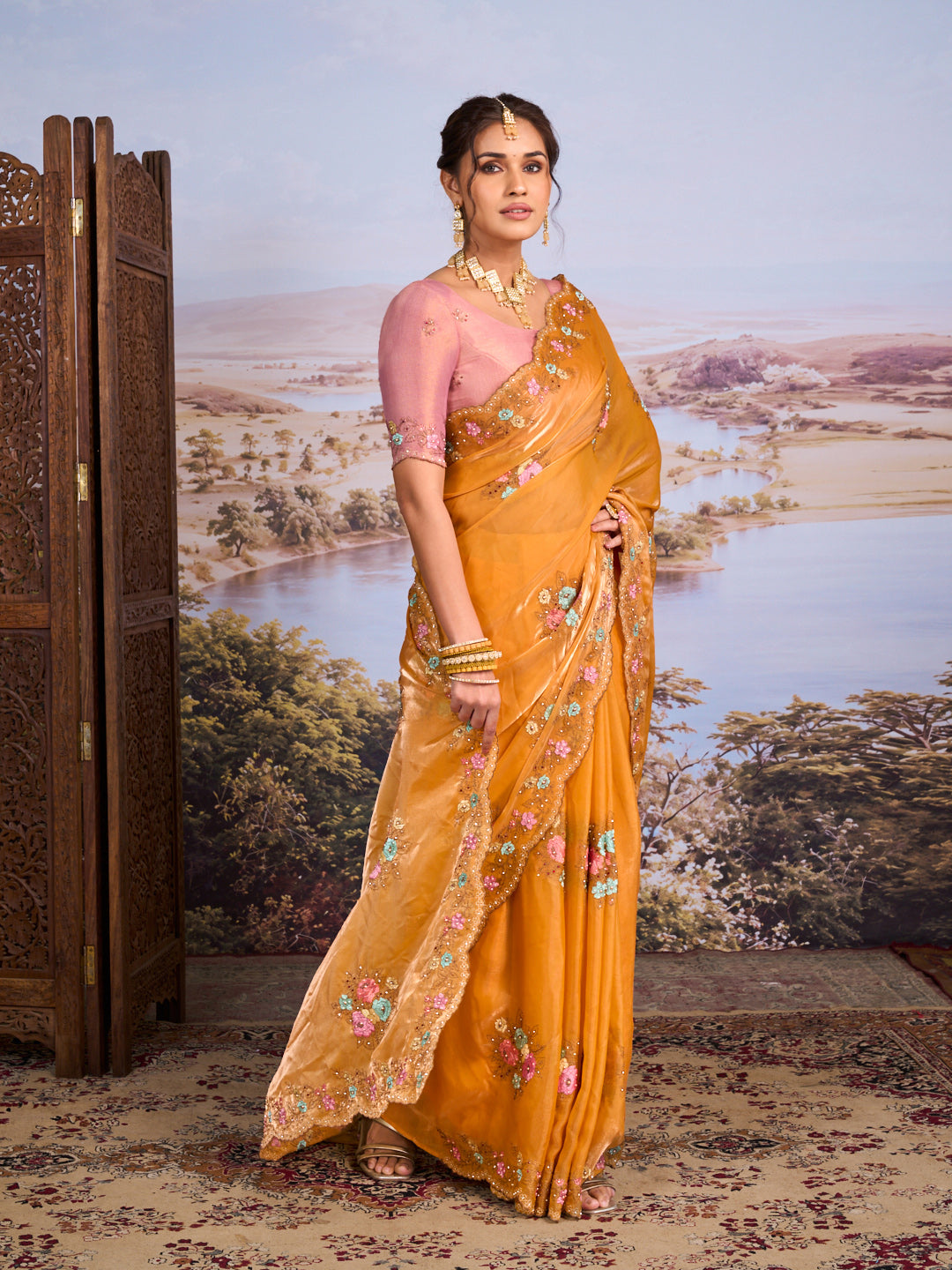 Orange floral embroidered chiffon saree wedding wear