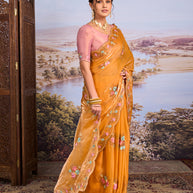 Orange floral embroidered chiffon saree wedding wear