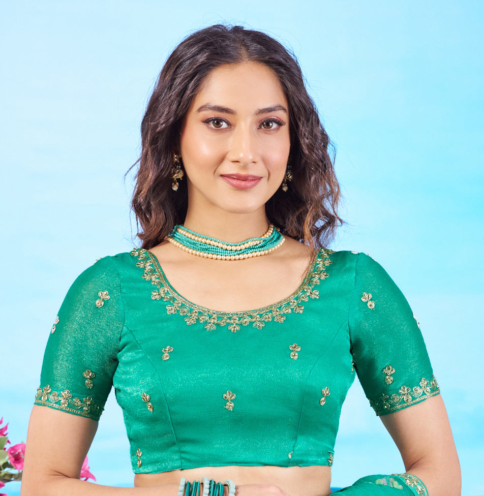 Green gold embroidered chiffon saree elegant wear