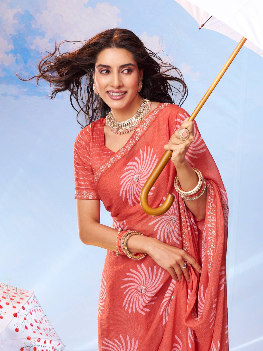 Peach swirl floral printed chiffon saree wedding wear