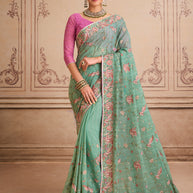 Green embroidered chiffon saree festive wear